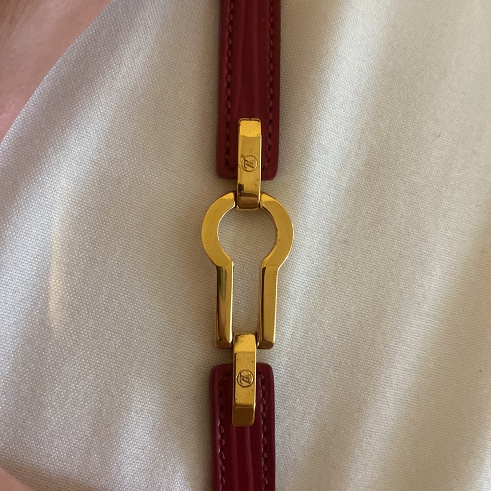 Authentic leather Louis Vuitton keyhole bracelet.
